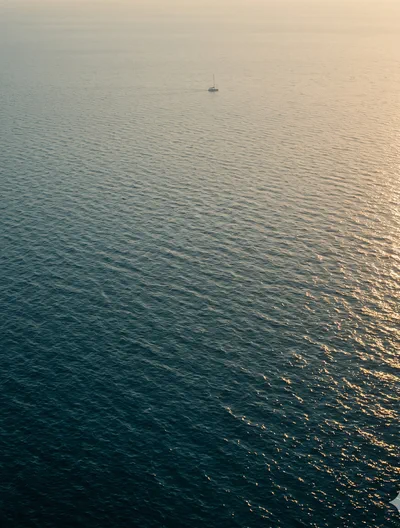Day boat on a turquoise Mediterranean cove